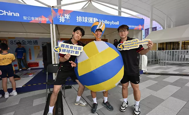 Beneficiaries of the Jockey Club Volleyball Community Programmes visit the Jockey Club booth and the Six International Sports Booths.