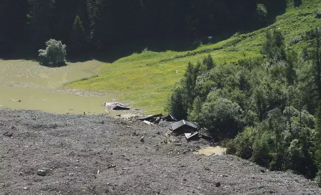 The aftermath of the Birch Glacier collapse is visible in Blatten, Switzerland, June 11, 2025. (AP Photo/Matthias Schrader)
