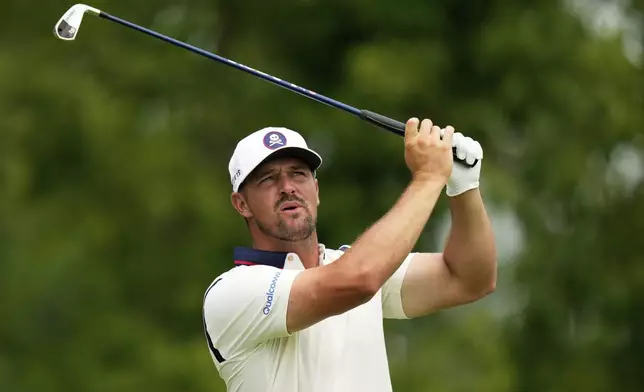 Bryson DeChambeau tees off on the 13th hole during the second round of the U.S. Open golf tournament at Oakmont Country Club Friday, June 13, 2025, in Oakmont, Pa. (AP Photo/Seth Wenig)