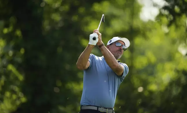 Phil Mickelson tees off on the 13th hole during the first round of the U.S. Open golf tournament at Oakmont Country Club Thursday, June 12, 2025, in Oakmont, Pa. (AP Photo/Carolyn Kaster)