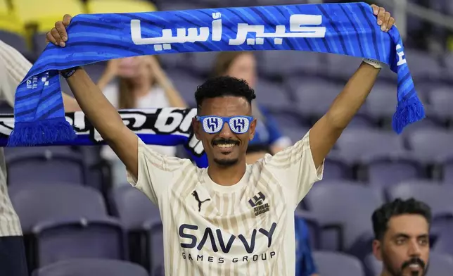 A fan of Al Hilal cheers prior to the Club World Cup Group H soccer match between Al Hilal and CF Pachuca in Nashville, Tenn., Thursday, June 26, 2025. (AP Photo/George Walker IV)
