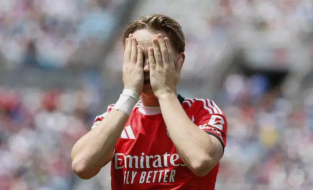 Benfica's Andreas Schjelderup reacts after scoring during the Club World Cup Group C soccer match between Benfica and Bayern Munich in Charlotte, N.C., Tuesday, June 24, 2025. (AP Photo/Nell Redmond)