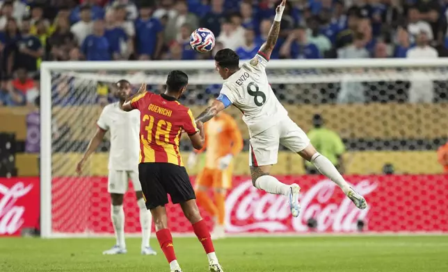 Chelsea's Enzo Fernandez, right, and Esperance de Tunis' Khalil Guenichi complete for the ball during the Club World Cup Group D soccer match between Esperance Tunisie and Chelsea in Philadelphia, Tuesday, June 24, 2025. (AP Photo/Matt Slocum)