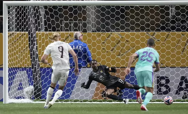 Manchester City's Erling Haaland (9) celebrates after scoring his side's third goal against Al Ain during the Club World Cup Group G soccer match between Manchester City and Al Ain in Atlanta, Sunday, June 22, 2025. (AP Photo/Brynn Anderson)