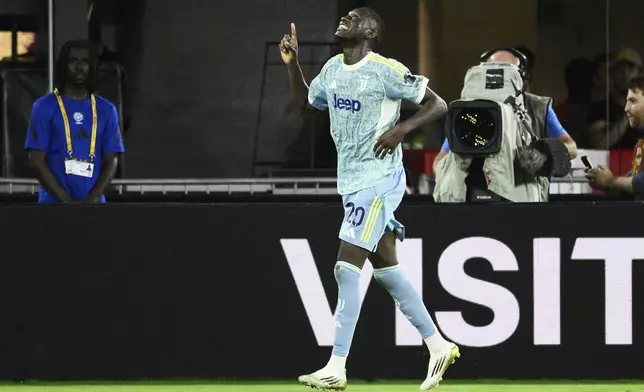 Juventus' Randal Kolo Muani celebrates after scoring his team's fourth goal during the Club World Cup group G soccer match between Al Ain and Juventus in Washington, Wednesday, June 18, 2025. (AP Photo/Nick Wass)