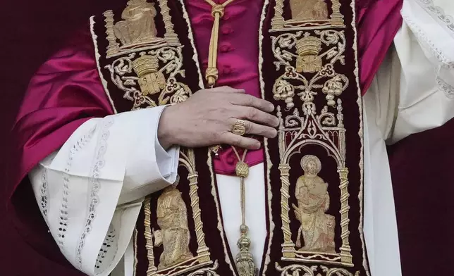 FILE - Newly elected Pope Leo XIV appears at the balcony of St. Peter's Basilica at the Vatican, May 8, 2025. (AP Photo/Alessandra Tarantino, File)