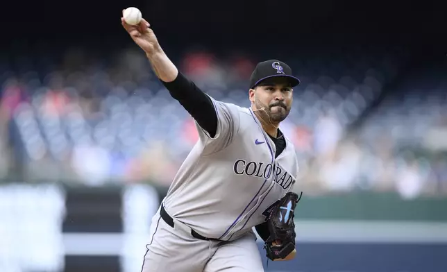 Colorado Rockies starting pitcher Antonio Senzatela throws during the first inning of a baseball game against the Washington Nationals, Tuesday, June 17, 2025, in Washington. (AP Photo/Nick Wass)