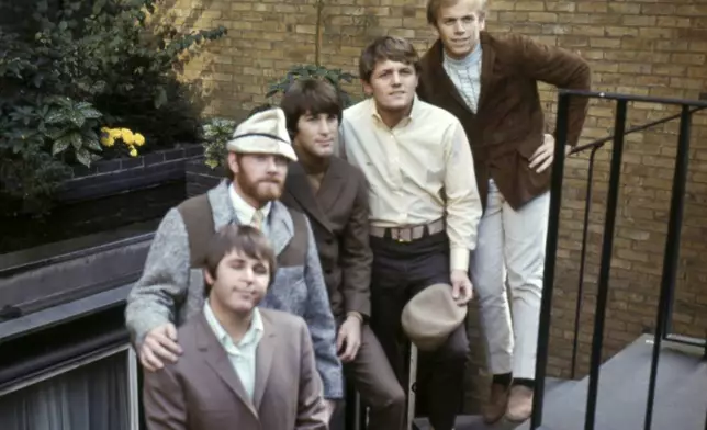 CORRECTS ID AT CENTER TO DENNIS WILSON, NOT BRIAN WILSON - FILE - The Beach Boys, from left, Carl Wilson, Mike Love, Dennis Wilson, Bruce Johnston, and Al Jardine pose for a portrait in London in November 1966. (AP Photo/Frank Tewksbury, File)