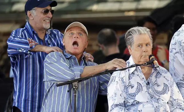 FILE - Original members of The Beach Boys, from left, David Marks, Bruce Johnston and Brian Wilson appear onstage during ABC's "Good Morning America" summer concert series, June 15, 2012, in New York. (Photo by Jason DeCrow/Invision/AP, File)