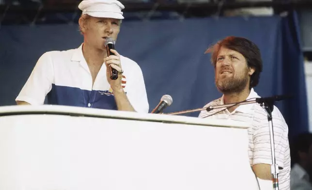 FILE - Mike Love, left, and Brian Wilson of The Beach Boys, perform at the Miller Time concert on Pier 84 on July 8, 1983 in New York. (AP Photo/ David Handschuh, File)