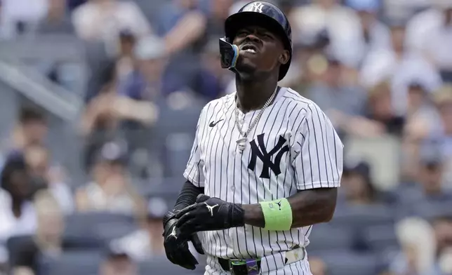 New York Yankees' Jazz Chisholm Jr. reacts after striking out during the sixth inning of a baseball game against the Athletics, Sunday, June 29, 2025, in New York. (AP Photo/Adam Hunger)