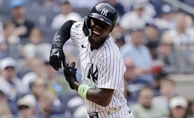 New York Yankees' Jazz Chisholm Jr. reacts after striking out during the sixth inning of a baseball game against the Athletics, Sunday, June 29, 2025, in New York. (AP Photo/Adam Hunger)