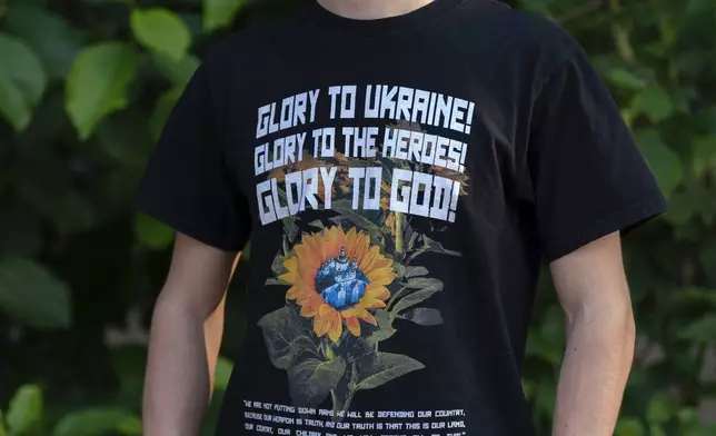 Vladyslav Plyaka poses for a photo at Capitol Hill neighborhood in Washington, Monday, June 2, 2025. Vladyslav Plyaka came to the U.S. from Ukraine as an exchange student in high school and stayed to attend the University of Wisconsin. His entry visa has expired, and he was planning to visit Poland to see his mother and renew his visa over the next year. He doesn't know when that will be possible now that visa appointments are suspended, and he doesn't feel safe leaving the country even when appointments resume. (AP Photo/Jose Luis Magana)