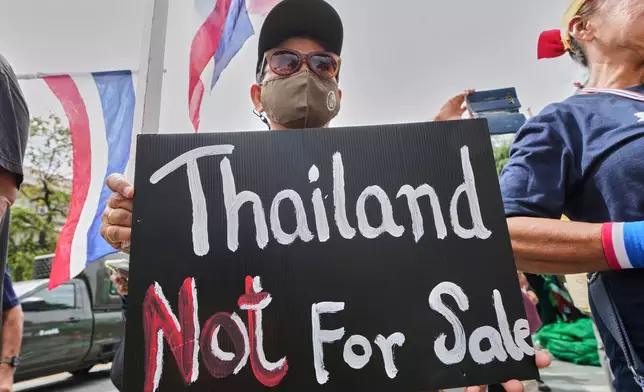 Anti-government protesters gather in front of Government house demanding Thailand's Prime Minister Paetongtarn Shinawatra resign in Bangkok, Thailand, Thursday, June 19, 2025, (AP Photo/Sakchai Lalit)
