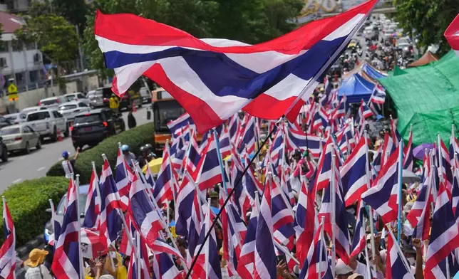 Anti-government protesters gather in front of Government house demanding Thailand's Prime Minister Paetongtarn Shinawatra resign in Bangkok, Thailand, Thursday, June 19, 2025, (AP Photo/Sakchai Lalit)