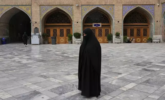 A woman prays at the courtyard of Imam mosque at Tehran's old main bazaar, Iran, Monday, May 5, 2025. (AP Photo/Vahid Salemi)