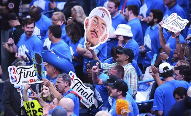 Fans cheer before Game 7 of the NBA Finals basketball series between the Indiana Pacers and the Oklahoma City Thunder Sunday, June 22, 2025, in Oklahoma City. (AP Photo/Nate Billings)