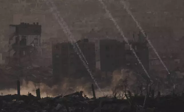 Israeli shelling hits an area in the northern of Gaza Strip as seen from southern Israel, Tuesday, June 3, 2025. (AP Photo/Leo Correa)