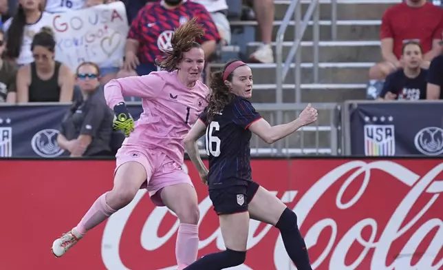Ireland goalkeeper Courtney Brosnan, left, collides with United States national team midfielder Rose Lavelle in the first half of an international women's friendly soccer match Thursday, June 26, 2025, in Commerce City, Colo. (AP Photo/David Zalubowski)