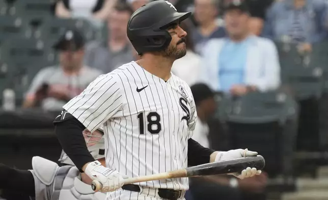 Chicago White Sox's Mike Tauchman reacts after striking out on a foul tip during the first inning of a baseball game against the Detroit Tigers in Chicago, Monday, June 2, 2025. (AP Photo/Nam Y. Huh)
