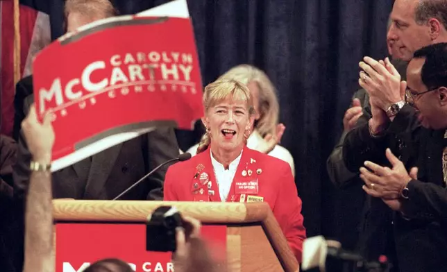 FILE - Carolyn McCarthy makes her acceptance speech at Adelphi University in Garden City, N.Y., Nov. 5, 1996, after defeating incumbent Republican congressman Dan Frisa. (AP Photo/Ron Frehm, File)