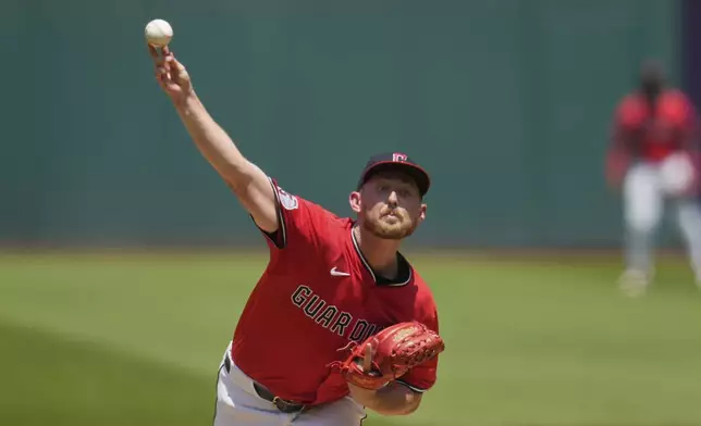 Cleveland Guardians' Tanner Bibee pitches in the first inning of a baseball game against the Toronto Blue Jays in Cleveland, Thursday, June 26, 2025. (AP Photo/Sue Ogrocki)