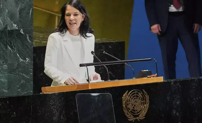 Annalena Baerbock of Germany addresses the United Nations General Assembly after she was elected as president of the 80th session of the body, Monday, June 2, 2025. (AP Photo/Richard Drew)