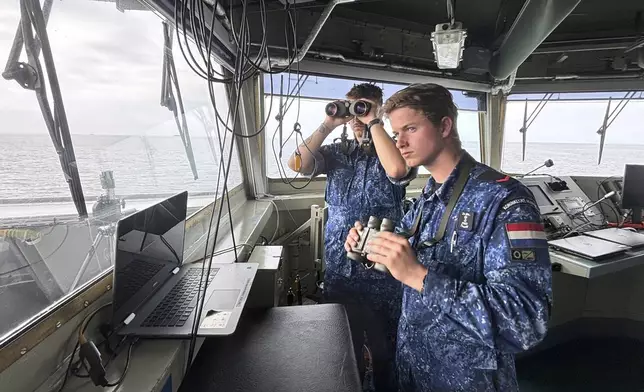 View of the bridge of the HNLMS Tromp, a Royal Netherlands Navy guided missile frigate, patrolling on the North Sea ahead of the NATO summit in The Hague, Netherlands, Thursday, June 19, 2025. (AP Photo/Aleksandar Furtula)