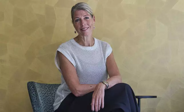 Bianca Veenhof of Gastrobar Berlage poses for a picture after an interview about the effects of security measures ahead of the NATO summit in The Hague, Netherlands, Wednesday, June 18, 2025. (AP Photo/Peter Dejong)