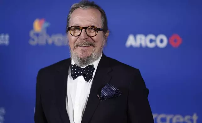 FILE - Gary Oldman poses in the press room during the 36th annual Palm Springs International Film Festival Awards Gala on Friday, Jan. 3, 2025, in Palm Springs, Calif. (Photo by Jordan Strauss/Invision/AP, file)