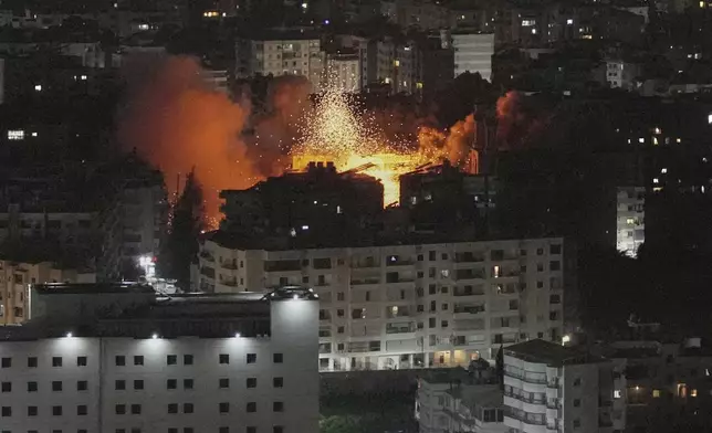 Flames and smoke rise following an Israeli airstrike on Dahiyeh in the southern suburb of Beirut, Lebanon, Thursday, June 5, 2025. (AP Photo/Hassan Ammar)