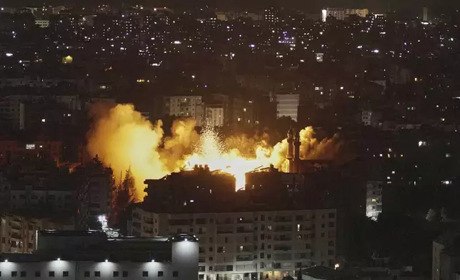 Flames and smoke rise following an Israeli airstrike on Dahiyeh in the southern suburb of Beirut, Lebanon, Thursday, June 5, 2025. (AP Photo/Hassan Ammar)