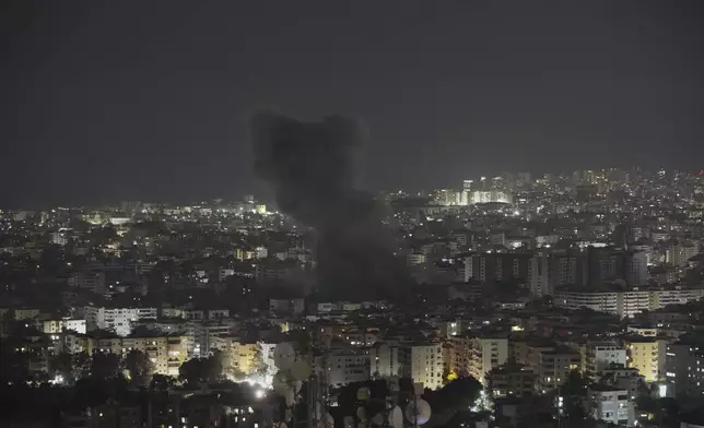 Smoke rises following an Israeli airstrike on Dahiyeh in the southern suburb of Beirut, Lebanon, Thursday, June 5, 2025. (AP Photo/Hassan Ammar)