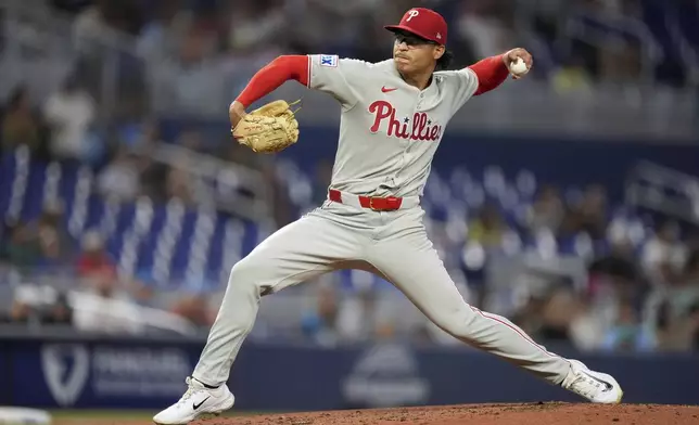 Philadelphia Phillies starting pitcher Jesus Luzardo pitches during the third inning of a baseball game against the Miami Marlins, Tuesday, June 17, 2025, in Miami. (AP Photo/Rebecca Blackwell)