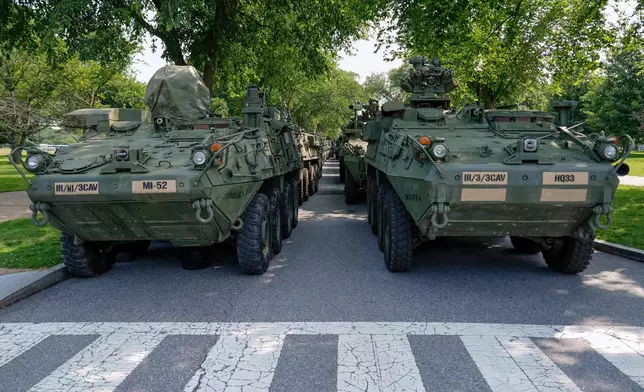 Stryker combat vehicles are staged in West Potomac Park ahead of an upcoming military parade commemorating the U.S. Army's 250th anniversary and coinciding with Donald Trump's 79th birthday, Wednesday, June 11, 2025, in Washington (AP Photo/Julia Demaree Nikhinson)