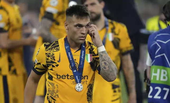 Inter Milan's Lautaro Martinez after the Champions League final soccer match between Paris Saint-Germain and Inter Milan at the Allianz Arena in Munich, Germany, Saturday, May 31, 2025. (AP Photo/Matthias Schrader)