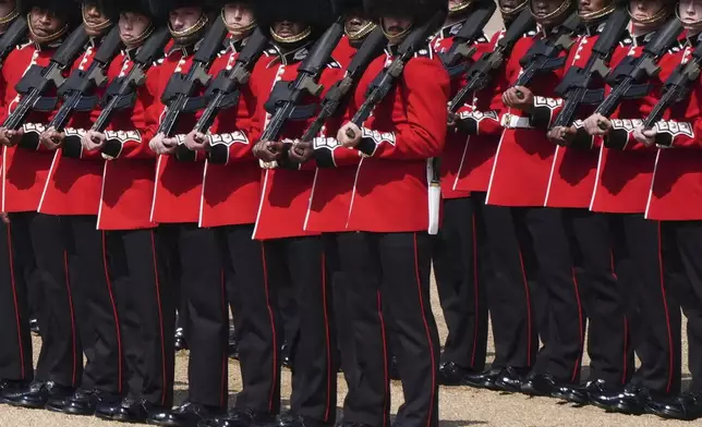 Members of the Scots Guards take part in the Trooping the Colour, the king's annual birthday parade, at Horse Guards Parade, in London, Saturday, June 14, 2025. (Jonathan Brady/PA via AP)