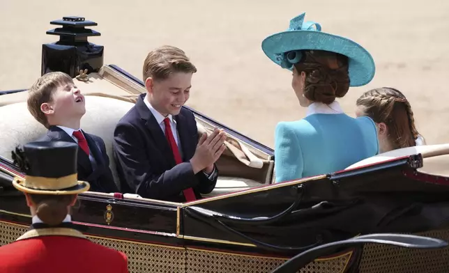 From left, Prince Louis, Prince George, Kate, the Princess of Wales and Princess Charlotte arrive for the Trooping the Colour, the king's annual birthday parade, at Horse Guards Parade, in London, Saturday, June 14, 2025. (Jonathan Brady/PA via AP)