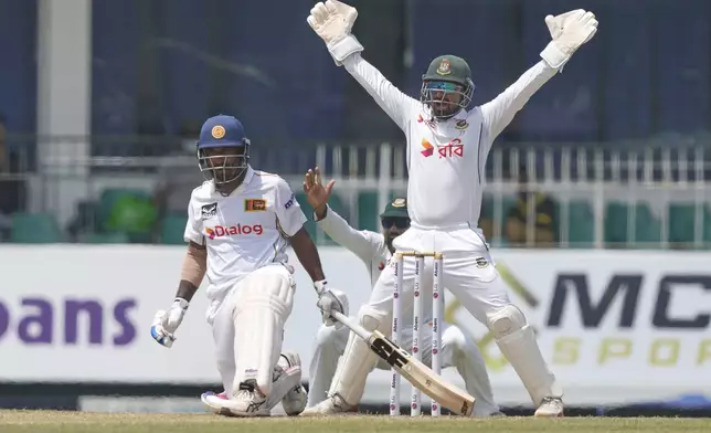 Sri Lanka's Lahiru Udara watches as Bangladesh's Litton Das appeals during the second day of the second cricket test match between Sri Lanka and Bangladesh in Colombo, Sri Lanka, Thursday, June 26, 2025. (AP Photo/Eranga Jayawardena)