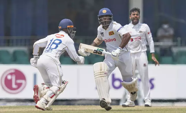 Sri Lanka's Lahiru Udara runs between the wickets during the second day of the second cricket test match between Sri Lanka and Bangladesh in Colombo, Sri Lanka, Thursday, June 26, 2025. (AP Photo/Eranga Jayawardena)
