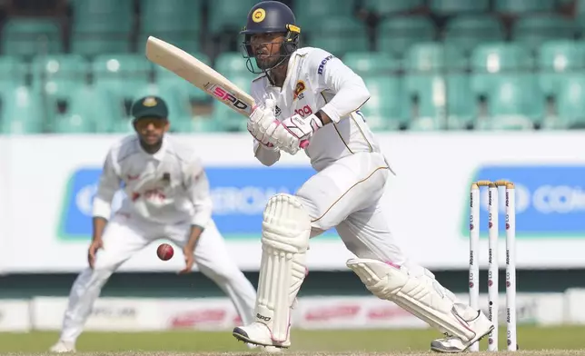 Sri Lanka's Dinesh Chandimal plays a shot during the second day of the second cricket test match between Sri Lanka and Bangladesh in Colombo, Sri Lanka, Thursday, June 26, 2025. (AP Photo/Eranga Jayawardena)