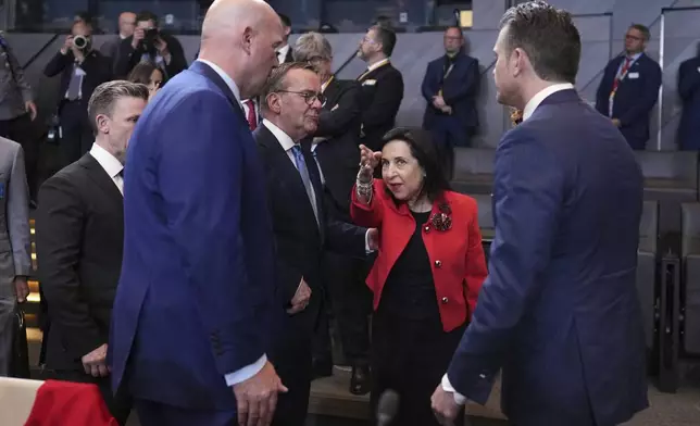 FILE- From left, Sweden's Defense Minister Pal Jonson, US Ambassador to NATO Matthew Whitaker, Germany's Defense Minister Boris Pistorius, Spain's Defense Minister Margarita Robles and Defense Secretary Pete Hegseth during a meeting of NATO defense ministers at NATO headquarters in Brussels, June 5, 2025. (AP Photo/Virginia Mayo, File)