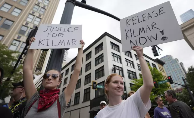 Natalie Schilling, Sydney Blocker gather outside the Federal Courthouse before arguments whether Kilmar Abrego Garcia can be released from jail on Friday, June 13, 2025 in Nashville, Tenn. (AP Photo/George Walker IV)