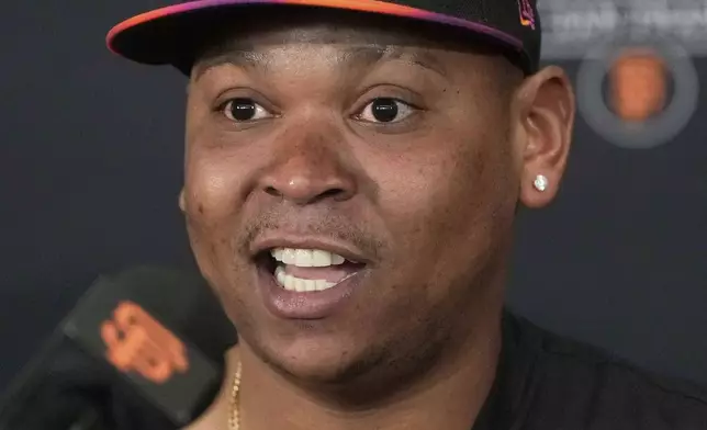 San Francisco Giants' Rafael Devers speaks at a news conference before a baseball game against the Cleveland Guardians in San Francisco, Tuesday, June 17, 2025. (AP Photo/Jeff Chiu)