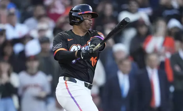 San Francisco Giants' Rafael Devers strikes out against the Cleveland Guardians during the first inning of a baseball game in San Francisco, Tuesday, June 17, 2025. (AP Photo/Jeff Chiu)
