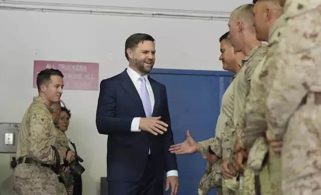 Vice President JD Vance visits with troops at the Wilshire Federal Building on Friday, June 20, 2025, in Los Angeles. (AP Photo/Jae C. Hong)
