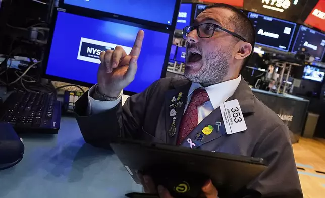 Trader Drew Cohen works on the floor of the New York Stock Exchange, Monday, June 23, 2025. (AP Photo/Richard Drew)