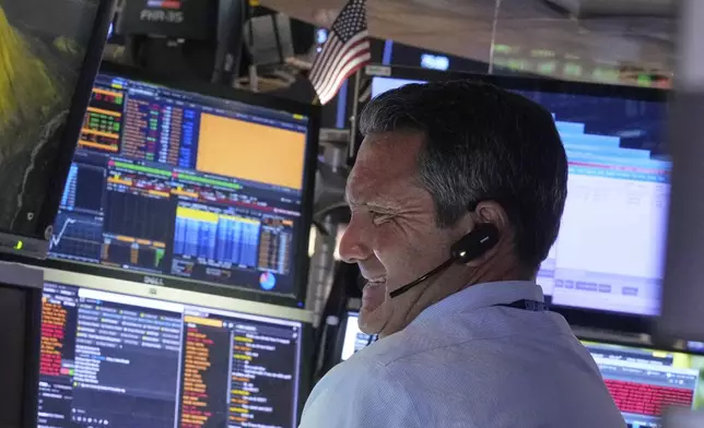 Trader Leon Montana works on the floor of the New York Stock Exchange, Monday, June 23, 2025. (AP Photo/Richard Drew)