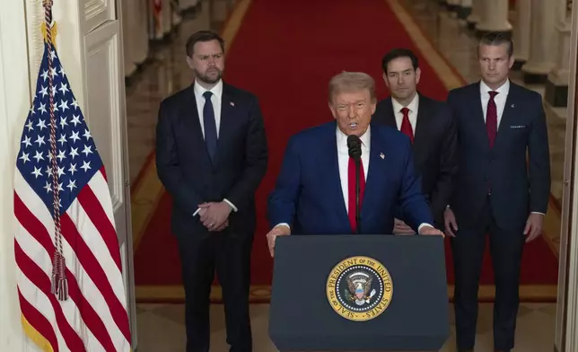 President Donald Trump speaks from the East Room of the White House in Washington, Saturday, June 21, 2025, after the U.S. military struck three Iranian nuclear and military sites, directly joining Israel's effort to decapitate the country's nuclear program, as Vice President JD Vance, Secretary of State Marco Rubio and Defense Secretary Pete Hegseth listen. (Carlos Barria/Pool via AP)