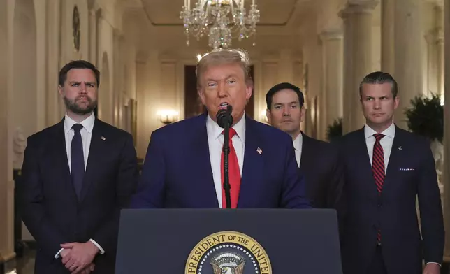 President Donald Trump speaks from the East Room of the White House in Washington, Saturday, June 21, 2025, after the U.S. military struck three Iranian nuclear and military sites, directly joining Israel's effort to decapitate the country's nuclear program, as Vice President JD Vance, Secretary of State Marco Rubio and Defense Secretary Pete Hegseth listen. (Carlos Barria/Pool via AP)